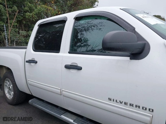 2012 Chevrolet Silverado 1500 LT with VIN 3GCPKSE72CG109571, listed as a IAAI auction lot 40809226 with 124,270 mi miles. Bid and sale history available at carsss.com. Image 13.
