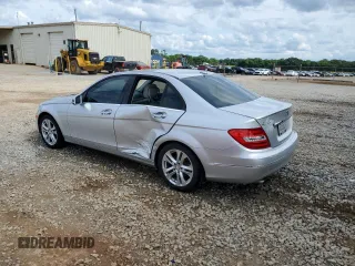 2014 Mercedes-Benz C 250 Sport with VIN WDDGF4HB1EA950028, listed as a Copart auction lot 58206825 with 105,523 mi miles and Salvage title. Bid and sale history available at DreamBid. Image 2.