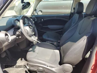 2012 MINI Hardtop with VIN WMWSU3C5XCT261853, listed as a Copart auction lot 49980285 with 110,638 mi miles and Salvage Title. Bid and sale history available at DreamBid. Image 7.