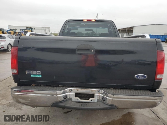 2000 Ford F-150 XL with VIN 3FTZF1728YMA63732, listed as a Copart auction lot 80010344 with Not provided miles and Salvage title. Bid and sale history available at DreamBid. Image 6.
