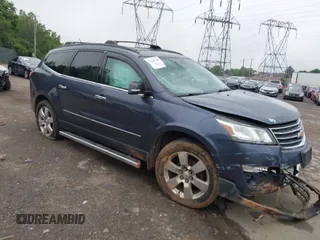 2013 Chevrolet Traverse LTZ z VIN 1GNKVLKDXDJ127289, wystawiony jako IAAI lot #42398760 z przebiegiem 215 691 mil mil oraz . Historia ofert i sprzedaży dostępna na DreamBid. Obrazek 1.