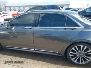 2017 Lincoln Continental Reserve z VIN 1LN6L9RP0H5636532, wystawiony jako IAAI lot #41882280 z przebiegiem 98 733 mil mil oraz . Historia ofert i sprzedaży dostępna na DreamBid. Obrazek 14.