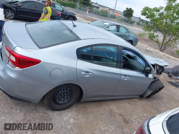 2017 Subaru Impreza z VIN 4S3GKAA65H1605641, wystawiony jako IAAI lot #42372317 z przebiegiem 74 676 mil mil oraz . Historia ofert i sprzedaży dostępna na DreamBid. Obrazek 13.