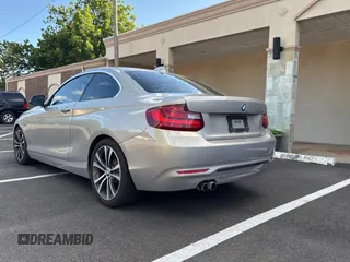 2015 BMW 2 Series 228i with VIN WBA1F5C59FV257027, listed as a Copart auction lot 62222855 with 113,383 mi miles and Clean title. Bid and sale history available at DreamBid. Image 3.