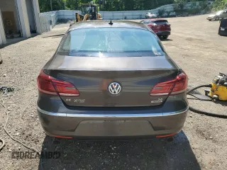 2014 Volkswagen CC VR6 Executive 4Motion with VIN WVWGU7AN3EE539874, listed as a Copart auction lot 61742974 with 124,358 mi miles and Salvage Title. Bid and sale history available at carsss.com. Image 6.