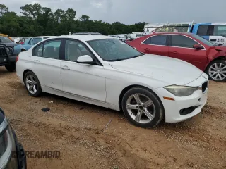 2014 BMW 3 Series 328i with VIN WBA3A5C59EP601899, listed as a Copart auction lot 61430675 with 205,396 mi miles and Salvage title. Bid and sale history available at DreamBid. Image 4.