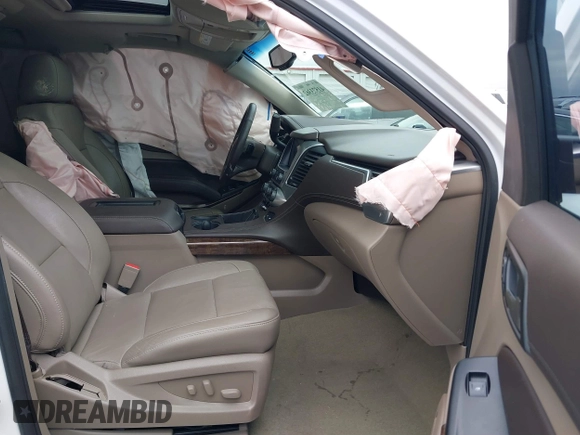 2017 Chevrolet Tahoe LT with VIN 1GNSKBKC1HR401044, listed as a IAAI auction lot 41573362 with 103,865 mi miles and . Bid and sale history available at DreamBid. Image 5.