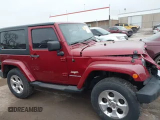 2013 Jeep Wrangler Sahara with VIN 1C4AJWBG7DL501146, listed as a IAAI auction lot 41714555 with 69,324 mi miles and . Bid and sale history available at DreamBid. Image 13.