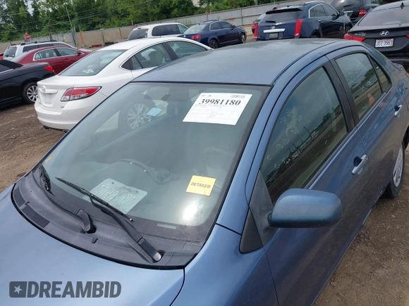 2007 Toyota Yaris with VIN JTDBT923X71093948, listed as a IAAI auction lot 39981180 with 317,082 mi miles. Bid and sale history available at carsss.com. Image 6.