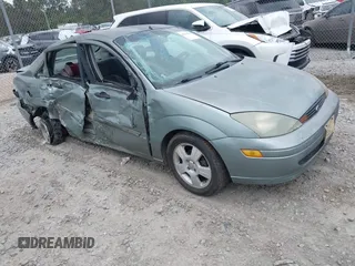 2004 Ford Focus SE z VIN 1FAFP34Z24W163287, wystawiony jako IAAI lot #42029695 z przebiegiem 159 542 mil mil oraz . Historia ofert i sprzedaży dostępna na DreamBid. Obrazek 1.