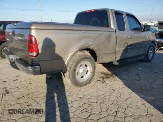 2001 Ford F-150 XL with VIN 1FTRX17L41NA96180, listed as a Copart auction lot 87309224 with 95,505 mi miles and Salvage title. Bid and sale history available at DreamBid. Image 3.