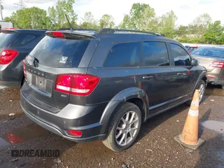 2014 Dodge Journey SXT with VIN 3C4PDCBB3ET172374, listed as a IAAI auction lot 42188228 with 138,129 mi miles. Bid and sale history available at carsss.com. Image 4.