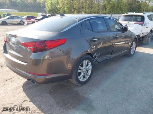 2012 Kia Optima LX with VIN 5XXGM4A7XCG069576, listed as a IAAI auction lot 41981909 with 189,080 mi miles. Bid and sale history available at carsss.com. Image 4.