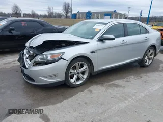 2012 Ford Taurus SHO z VIN 1FAHP2KT6CG142954, wystawiony jako IAAI lot #41526760 z przebiegiem 187 887 mil mil oraz . Historia ofert i sprzedaży dostępna na DreamBid. Obrazek 19.