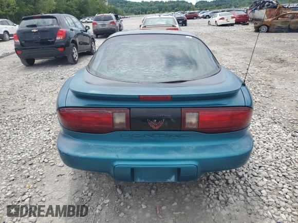 1995 Pontiac Firebird Firebird z VIN 2G2FS22S6S2237631, wystawiony jako Copart lot #61542625 z przebiegiem Nie podano mil oraz Szkoda całkowita • Salvage title. Historia ofert i sprzedaży dostępna na DreamBid. Obrazek 6.