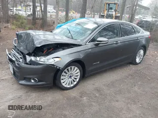 2016 Ford Fusion SE Hybrid with VIN 3FA6P0LU2GR388787, listed as a IAAI auction lot 41733661 with 86,078 mi miles and . Bid and sale history available at DreamBid. Image 17.