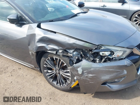 2016 Nissan Maxima SL z VIN 1N4AA6AP8GC417817, wystawiony jako IAAI lot #41772451 z przebiegiem 78 880 mil mil oraz . Historia ofert i sprzedaży dostępna na DreamBid. Obrazek 6.