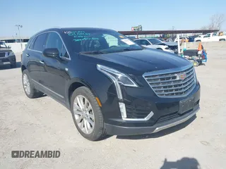2017 Cadillac XT5 Platinum AWD z VIN 1GYKNFRS7HZ103127, wystawiony jako IAAI lot #41830037 z przebiegiem 82 480 mil mil oraz . Historia ofert i sprzedaży dostępna na DreamBid. Obrazek 1.