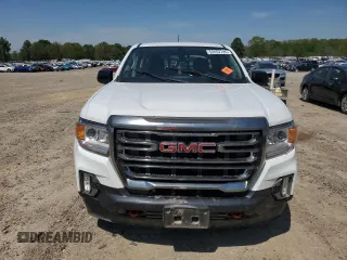 2021 GMC Canyon 4WD AT4 z VIN 1GTG6FEN5M1118081, wystawiony jako Copart lot #52452785 z przebiegiem 92 960 mil mil oraz Szkody całkowita. Historia ofert i sprzedaży dostępna na DreamBid. Obrazek 5.