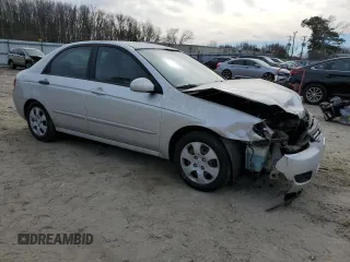 2009 Kia Spectra EX z VIN KNAFE222695665181, wystawiony jako Copart lot #42852235 z przebiegiem 234 852 mil mil oraz Szkody całkowita. Historia ofert i sprzedaży dostępna na DreamBid. Obrazek 4.