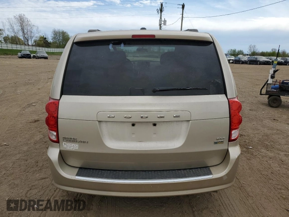 2016 Dodge Grand Caravan SXT with VIN 2C4RDGCGXGR312372, listed as a Copart auction lot 54943615 with 127,576 mi miles and Clean Title. Bid and sale history available at DreamBid. Image 6.