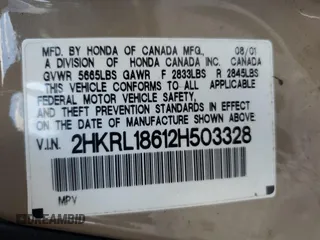 2002 Honda Odyssey EX z VIN 2HKRL18612H503328, wystawiony jako Copart lot #52699095 z przebiegiem 241 741 mil mil oraz Szkoda całkowita • Salvage title. Historia ofert i sprzedaży dostępna na DreamBid. Obrazek 15.