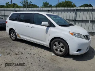 2015 Toyota Sienna LE AAS with VIN 5TDKK3DC5FS579839, listed as a Copart auction lot 54188505 with 189,960 mi miles and Salvage Title. Bid and sale history available at DreamBid. Image 4.