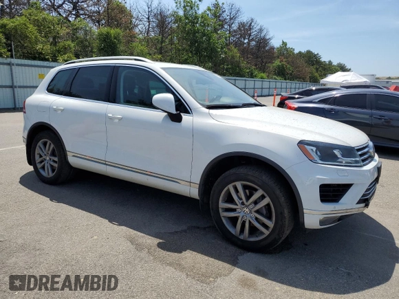 2016 Volkswagen Touareg Sport with VIN WVGEF9BPXGD010830, listed as a Copart auction lot 58663734 with 148,091 mi miles and Salvage Title. Bid and sale history available at DreamBid. Image 4.