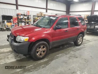 2007 Ford Escape XLT with VIN 1FMYU03Z27KA05874, listed as a Copart auction lot 73295564 with 127,088 mi miles and Salvage Title. Bid and sale history available at carsss.com. Image 1.