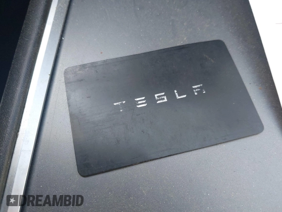 2022 Tesla Model 3 with VIN 5YJ3E1EA7NF103513, listed as a IAAI auction lot 41643592 with 35,631 mi miles and . Bid and sale history available at DreamBid. Image 11.