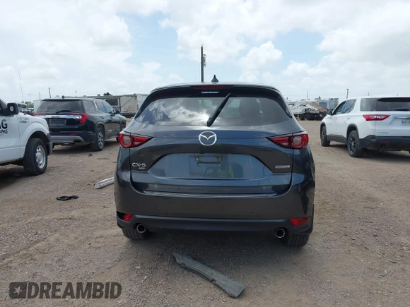 2021 Mazda CX-5 Grand Touring with VIN JM3KFBDM2M0431484, listed as a IAAI auction lot 42547665 with 34,757 mi miles and . Bid and sale history available at DreamBid. Image 17.