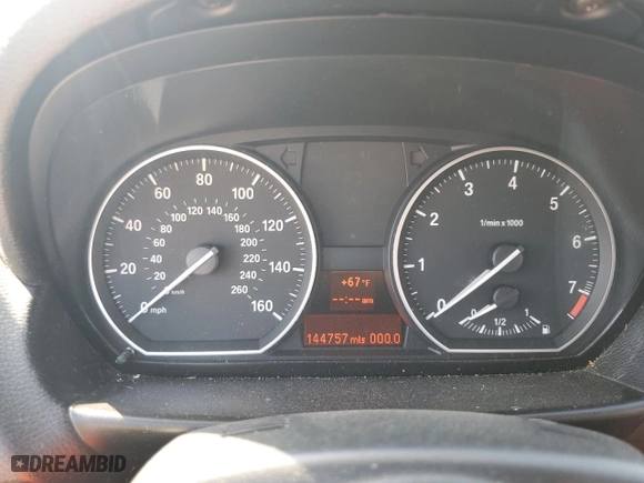 2010 BMW 1 Series 128i with VIN WBAUL7C54AVJ77774, listed as a Copart auction lot 44240265 with 144,757 mi miles and Salvage Title. Bid and sale history available at carsss.com. Image 9.