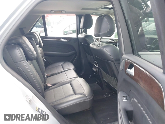 2013 Mercedes-Benz M 350 with VIN 4JGDA5HB4DA166924, listed as a IAAI auction lot 42370011 with 120,648 mi miles and . Bid and sale history available at DreamBid. Image 8.