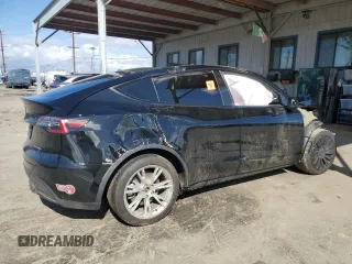 2024 Tesla Model Y Long Range z VIN 7SAYGDEE1RA247973, wystawiony jako Copart lot #45679205 z przebiegiem 22 739 mil mil oraz Szkoda całkowita • Salvage title. Historia ofert i sprzedaży dostępna na DreamBid. Obrazek 3.