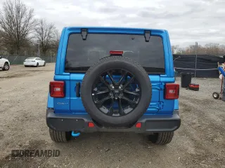2022 Jeep Wrangler Unlimited Sahara with VIN 1C4JJXP64NW218810, listed as a Copart auction lot 49864565 with 19,462 mi miles and Non repairable. Bid and sale history available at DreamBid. Image 6.