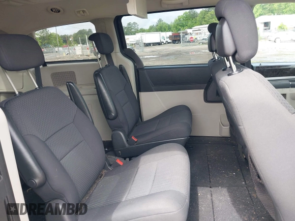 2010 Dodge Grand Caravan SXT with VIN 2D4RN5D11AR459864, listed as a IAAI auction lot 42197818 with 149,553 mi miles and . Bid and sale history available at DreamBid. Image 8.