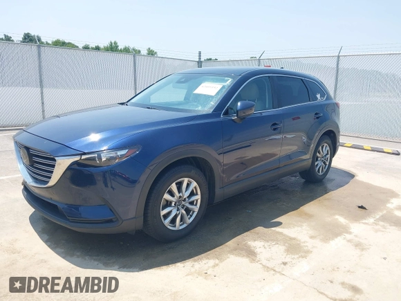 2018 Mazda CX-9 Touring with VIN JM3TCBCY3J0220372, listed as a IAAI auction lot 42405192 with 104,556 mi miles and . Bid and sale history available at DreamBid. Image 2.