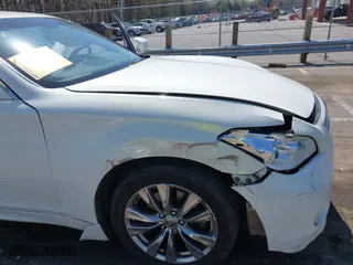 2013 Infiniti M37 with VIN JN1BY1AR3DM600744, listed as a IAAI auction lot 41912310 with 200,014 mi miles. Bid and sale history available at carsss.com. Image 6.