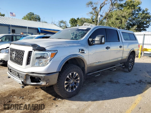 2016 Nissan Titan XD PRO-4X with VIN 1N6BA1F4XGN509643, listed as a Copart auction lot 74530434 with 83,734 mi miles and Clean Title. Bid and sale history available at carsss.com. Image 1.