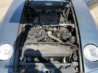 1989 Porsche 928 z VIN WP0JB0925KS860924, wystawiony jako Copart lot #51871105 z przebiegiem Nie podano mil oraz Szkody całkowita. Historia ofert i sprzedaży dostępna na DreamBid. Obrazek 11.