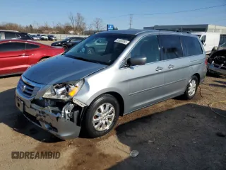 2010 Honda Odyssey EX-L with VIN 5FNRL3H62AB031763, listed as a Copart auction lot 52800055 with 220,450 mi miles and Salvage Title. Bid and sale history available at DreamBid. Image 1.
