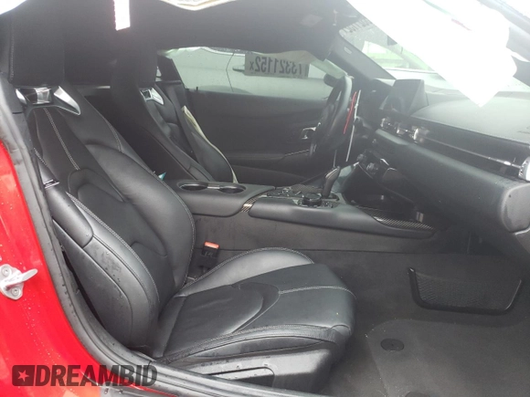 2021 Toyota Supra 3.0 z VIN WZ1DB0C02MW044450, wystawiony jako Copart lot #73321152 z przebiegiem Nie podano mil oraz . Historia ofert i sprzedaży dostępna na DreamBid. Obrazek 10.