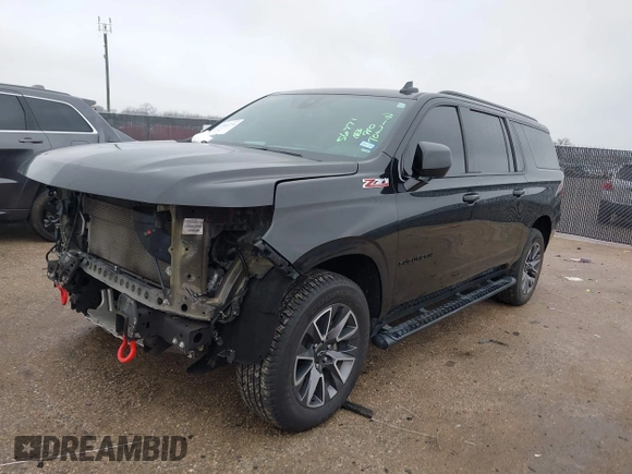 2022 Chevrolet Suburban Z71 with VIN 1GNSKDKD3NR251387, listed as a IAAI auction lot 41566234 with 154,014 mi miles. Bid and sale history available at carsss.com. Image 17.