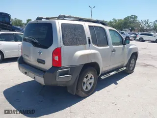 2010 Nissan Xterra S with VIN 5N1AN0NU5AC507912, listed as a IAAI auction lot 42071382 with 180,869 mi miles. Bid and sale history available at carsss.com. Image 4.