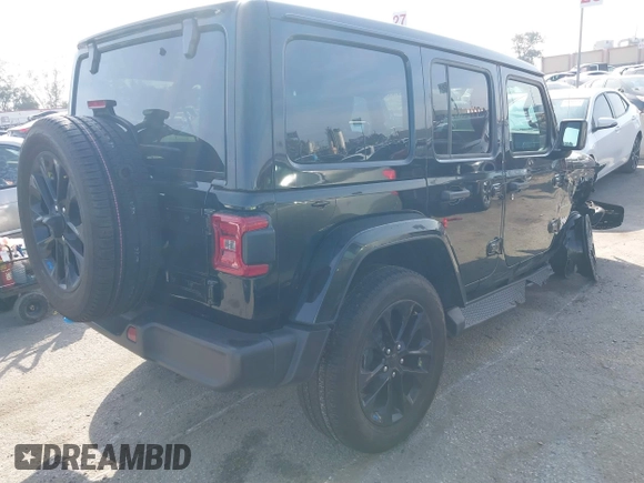 2023 Jeep Wrangler Sahara with VIN 1C4JJXP67PW556933, listed as a IAAI auction lot 41587035 with 20,463 mi miles and . Bid and sale history available at DreamBid. Image 4.