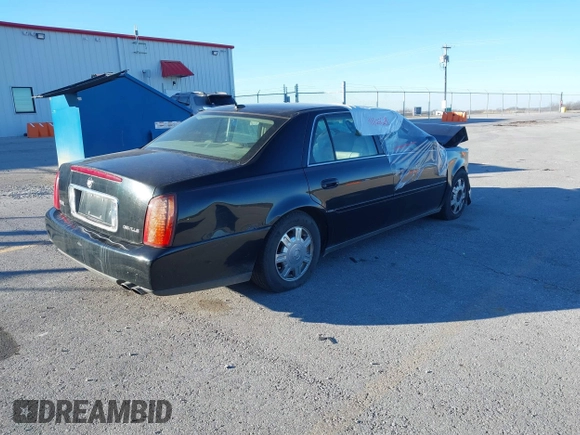 2005 Cadillac DeVille with VIN 1G6KD54Y05U152924, listed as a IAAI auction lot 41025529 with 1 mi miles. Bid and sale history available at carsss.com. Image 4.