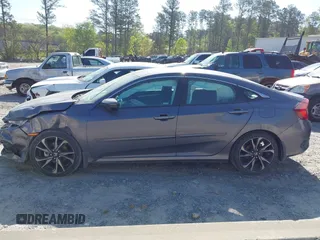 2019 Honda Civic Sport with VIN 2HGFC2F8XKH598141, listed as a IAAI auction lot 42013724 with 98,401 mi miles and . Bid and sale history available at DreamBid. Image 14.