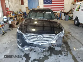 2021 Mazda CX-9 Grand Touring with VIN JM3TCBDY5M0512429, listed as a Copart auction lot 44445625 with 64,989 mi miles and Salvage title. Bid and sale history available at DreamBid. Image 5.