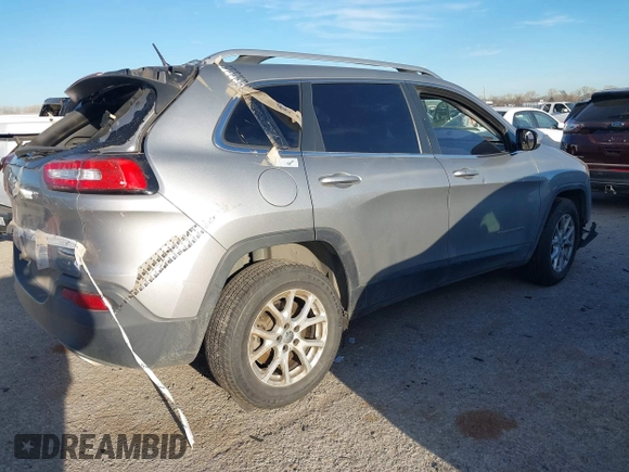 2015 Jeep Cherokee Latitude z VIN 1C4PJMCS3FW673872, wystawiony jako IAAI lot #41778031 z przebiegiem 173 845 mil mil oraz . Historia ofert i sprzedaży dostępna na DreamBid. Obrazek 4.