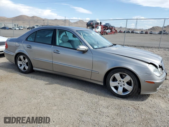 2004 Mercedes-Benz E-Class 5.0L with VIN WDBUF70J54A496963, listed as a Copart auction lot 64214634 with 113,575 mi miles and Salvage Title. Bid and sale history available at carsss.com. Image 4.